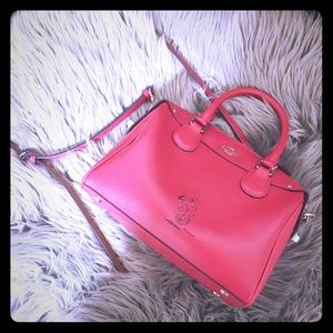 Red Snoopy Coach bag in great conditions